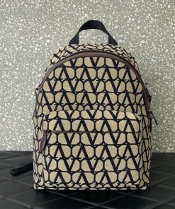 Design TOILE ICONOGRAPHE BACKPACK WITH LEATHER DETAILING